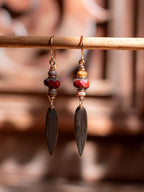 Boucles d’oreilles Folia – Perles en verre tchèque & feuilles de en laiton