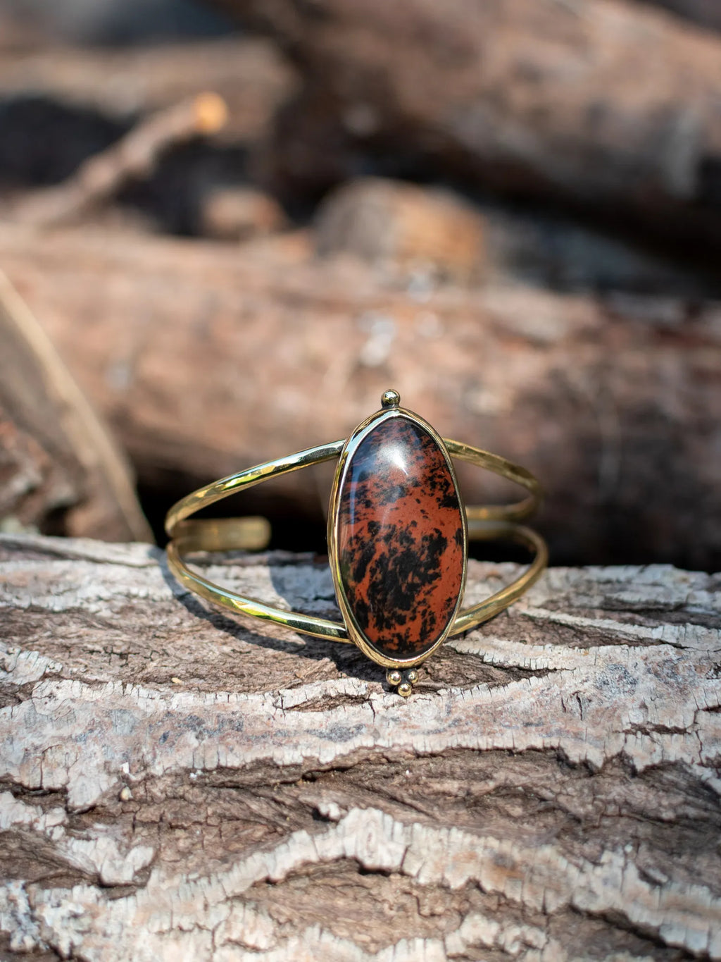 Bracelet manchette avec une obsidienne acajou