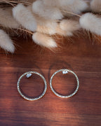 Petites créoles en laiton motif petites lunes