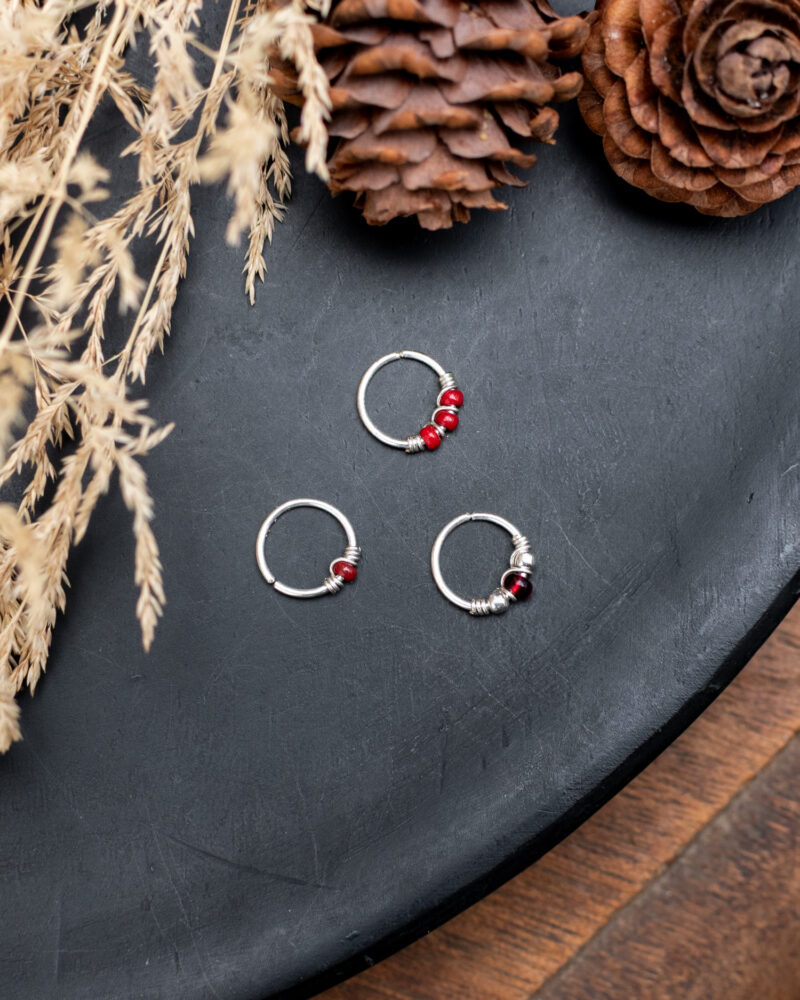 Trio d'anneaux en argent 925. Carmin
