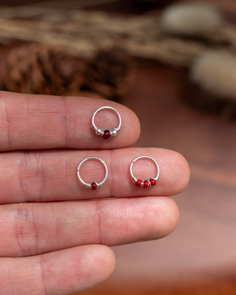 Trio d'anneaux en argent 925. Carmin